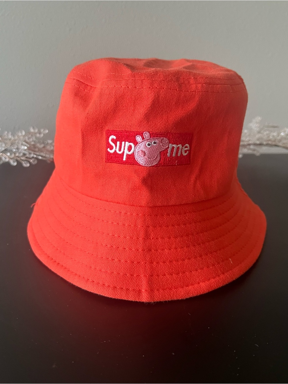 Reddish Bucket Hat with Peppa Pig Supreme Patch